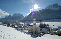 The snow-covered village Sesto in Alta Pusteria